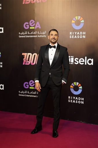 عز